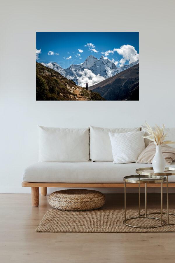 frame of a sherpa in the Himalayas, displayed in a living room